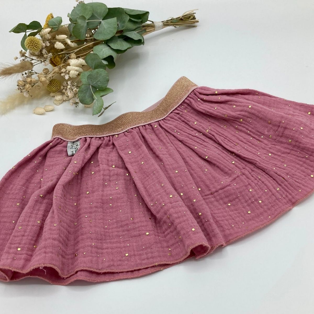Jupette bébé ou petite fille rose framboise